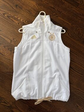 adidas White Sleeveless Zip-Up Vest with Gold Logos. Team Germany
